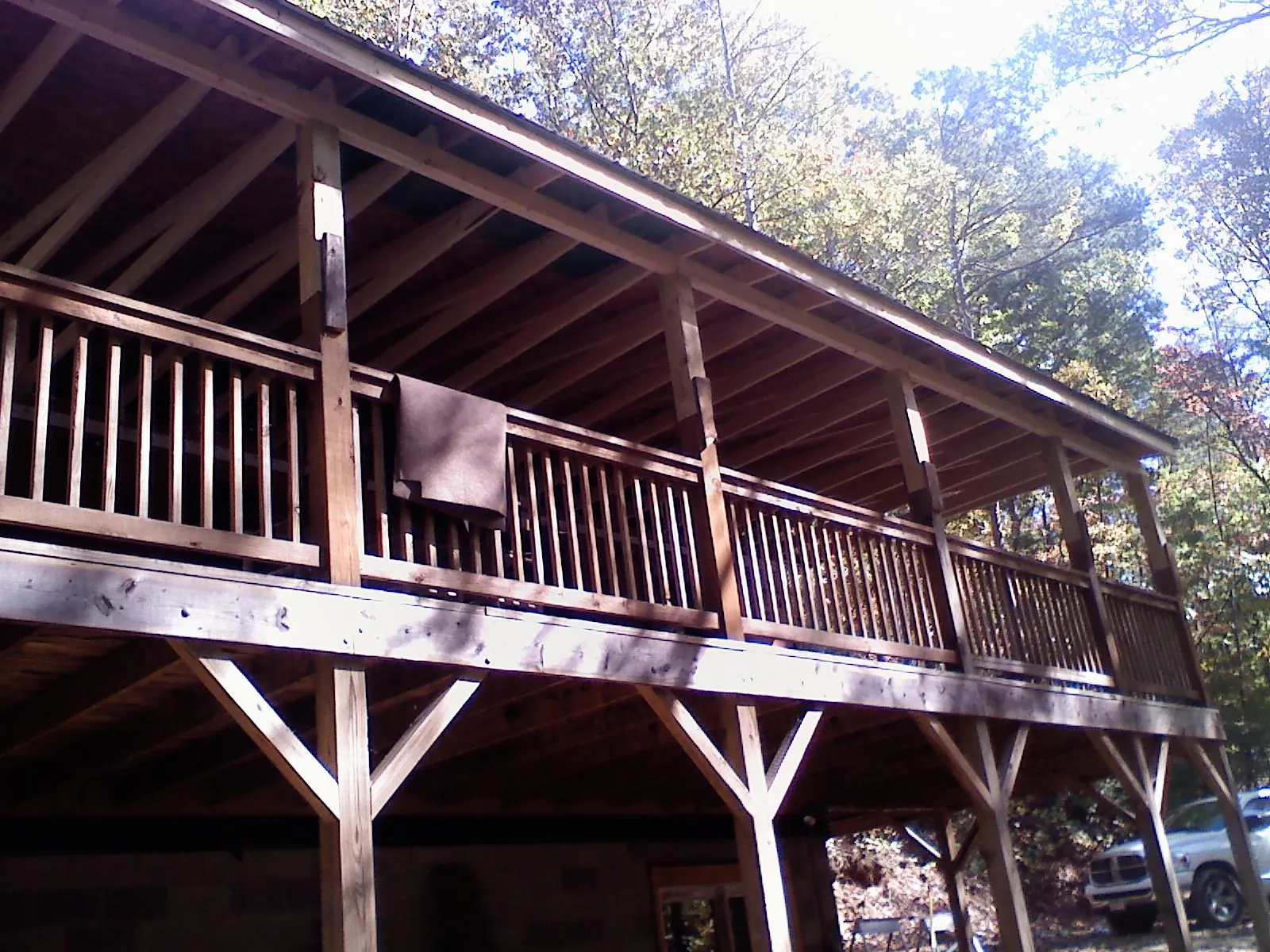 Timber framing under a new elevated porch and deck — Roof Leak Repair in Holly Springs by Roofing Brothers