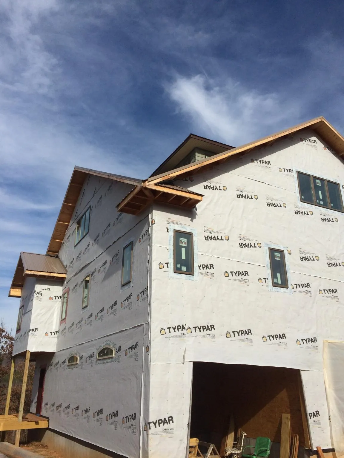 Stick built house wrapped in Typar with new roof framing and dormers in Holly Springs